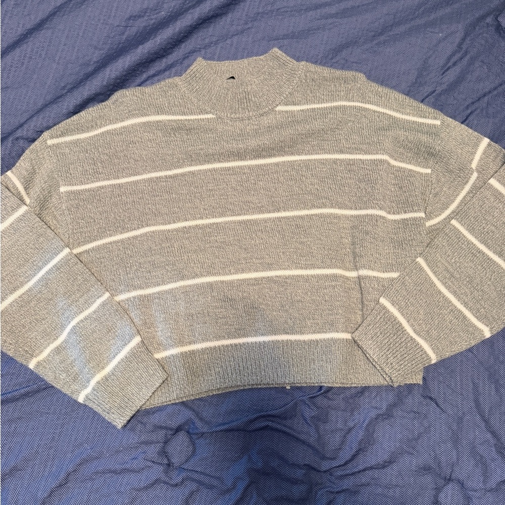 Divided Gray and White Striped Turtleneck Sweater